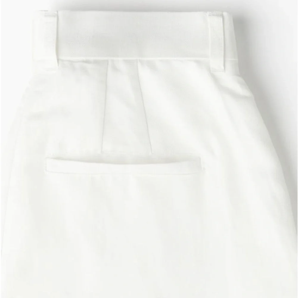 White linen trousers